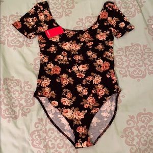 Really cute body suit!! Brand new with tags!!!